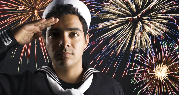 Sailor saluting with fireworks