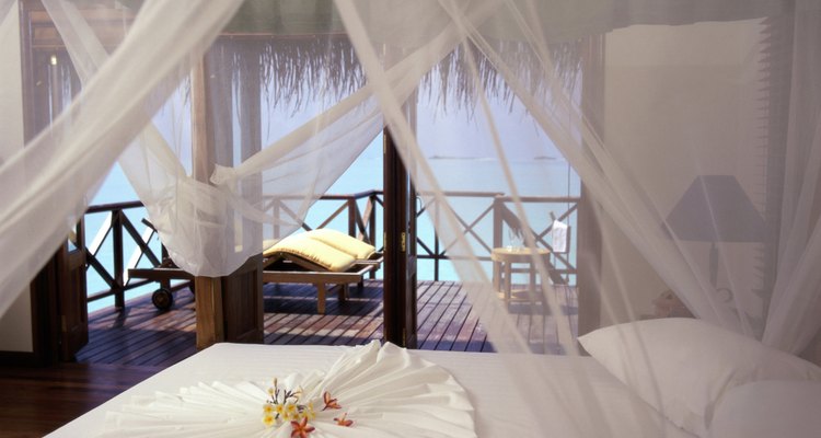 Canopy bed in a hotel room