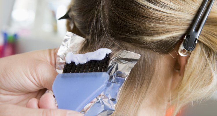 Woman coloring hair