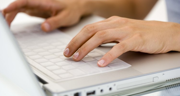 Woman's hands typing