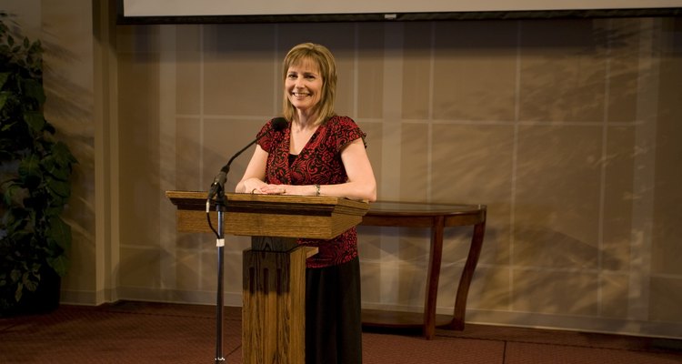 A woman giving a speech