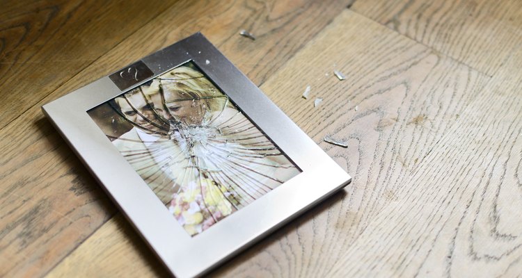 Broken picture frame with married couple