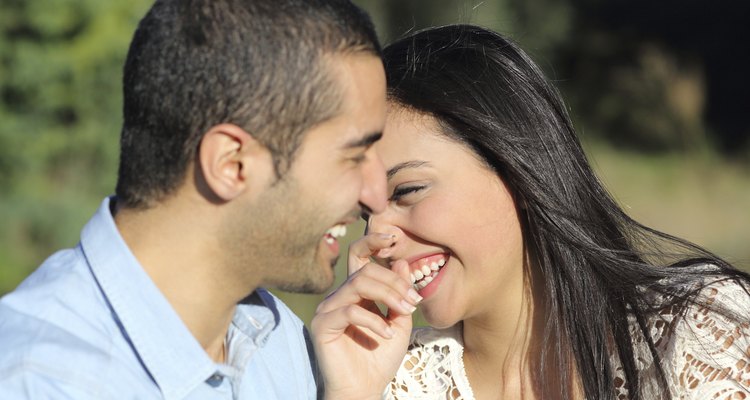 Arab casual couple man and woman flirting and laughing