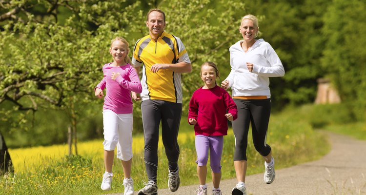 Family jogging for sport outdoors