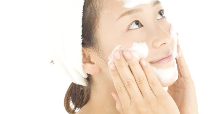 Woman washing her face