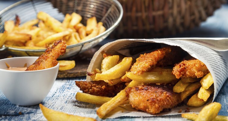 Closeup of Fish & Chips served in paper