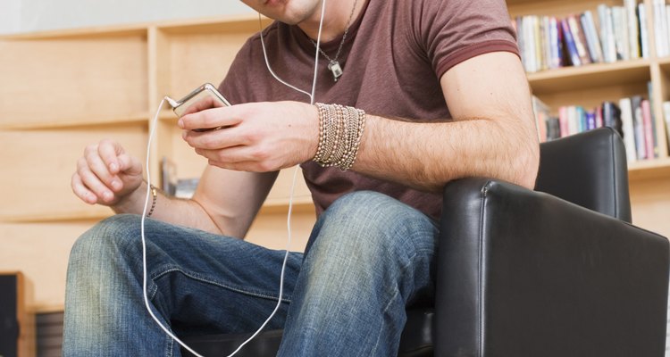 Man listening to MP3 player