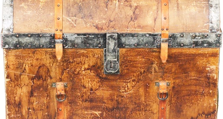 Use an antique trunk for storage in your country-style living room.