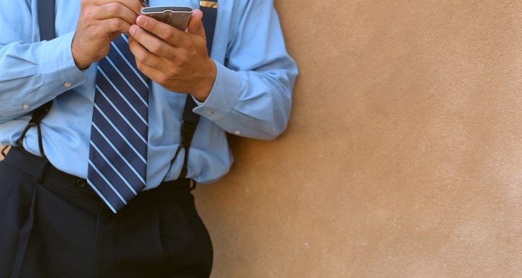 Businessman using PDA