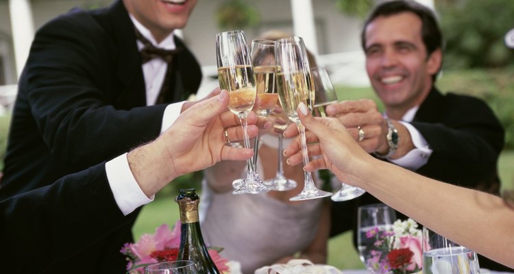 Group of people toasting with glasses of champagne