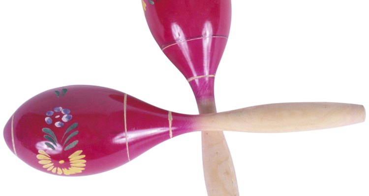 Make your own maracas with yoghurt cups and dried beans.