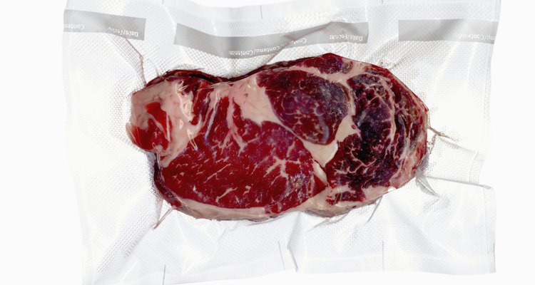 Vacuum sealed frozen cut of beef