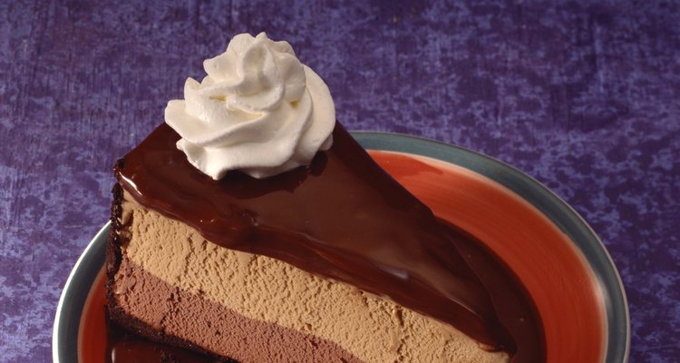 Spread whipped cream evenly over cake.