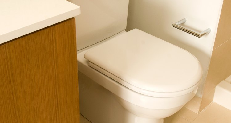 Many bathroom walls are covered with tile for superior water resistance.