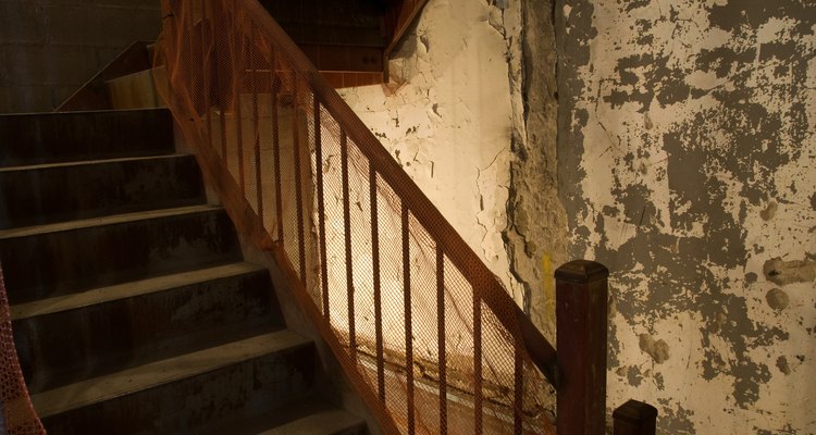 Clean old banisters with a solution that will clean and condition the wood.
