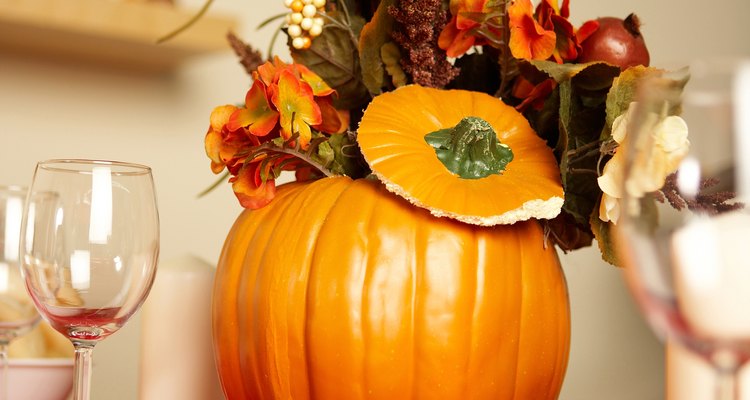 Selecting a theme and an unusual container makes an interesting floral arrangment.