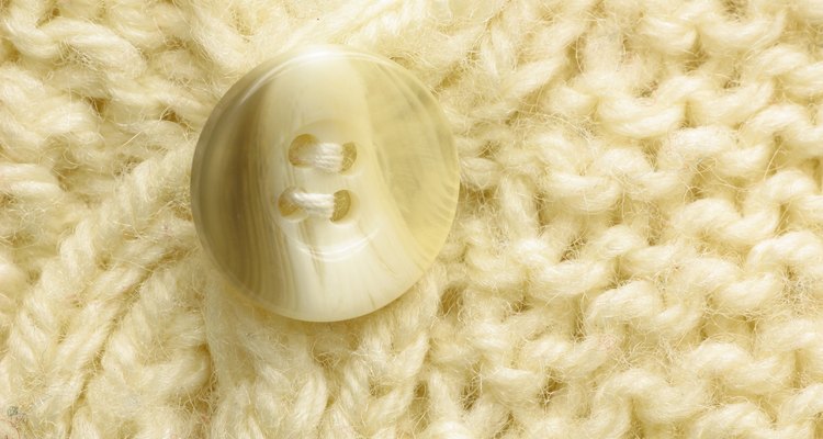 Button on knitted sweater