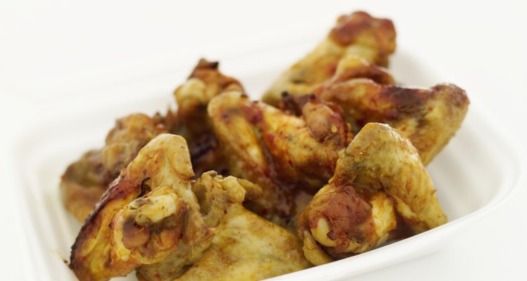 Close-up of a plate of fried chicken wings