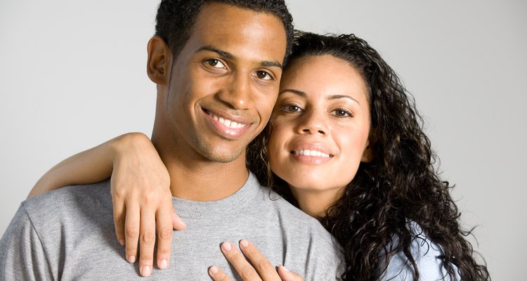 Studio portrait of smiling couple