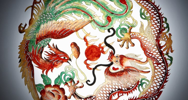 Feng Huang, the Chinese version of the phoenix, is depicted here paired with a dragon.