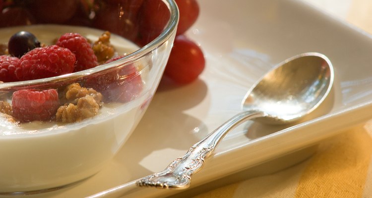 Bowl of yogurt with nuts and berries