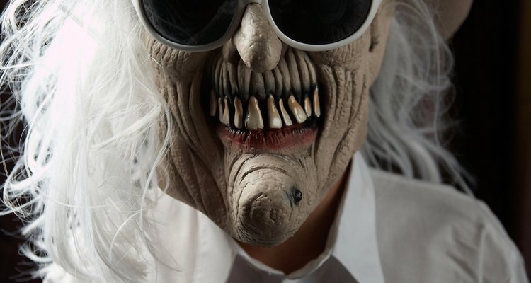 Fix tears in a Halloween mask.