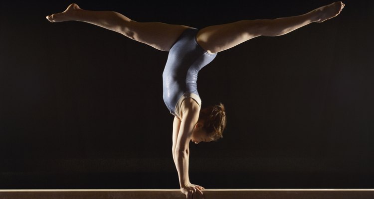 Gymnast Doing Split Handstand on Balance Beam