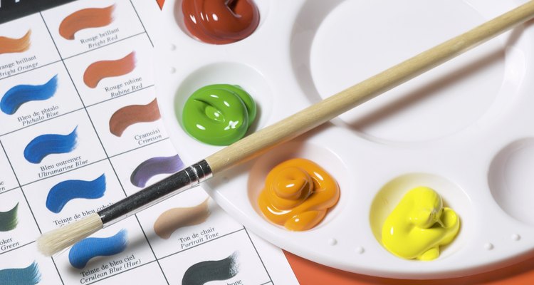 Glitter pens work well on acrylic paints, as the colour darkens once dry.