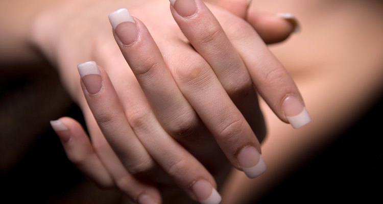 Woman crossing manicured hands