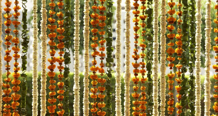 Hang curtains, retractable shades or beads for easy, inexpensive room dividers.
