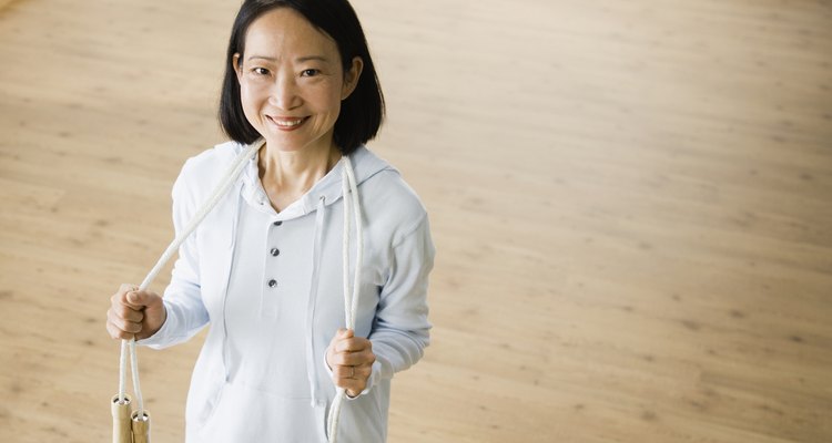 Asian woman holding jump rope