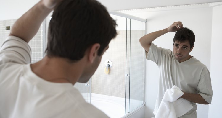 Cómo quitar lo plateado de un espejo