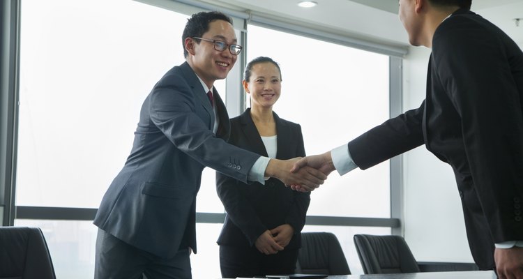 Businessmen Greeting Each Other with a Handshake