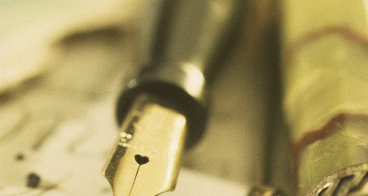 A solid gold barrel overlay pen is coded by a 3 in the hundreds place of a four-digit Waterman's serial number.