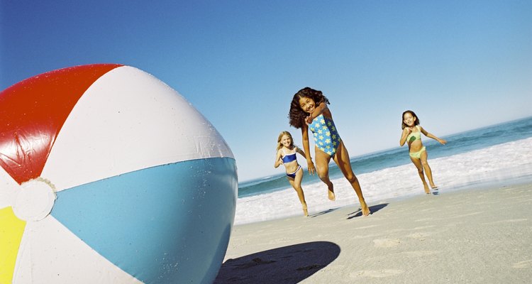 Girls playing with a beach ball