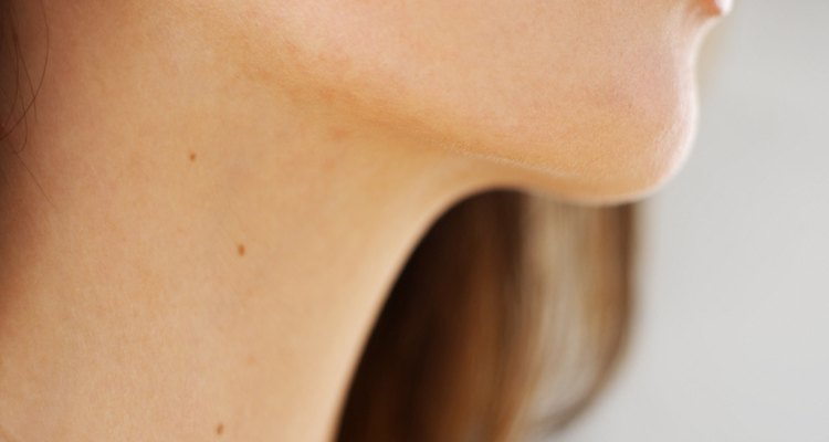 Close-up of a woman's chin and neck
