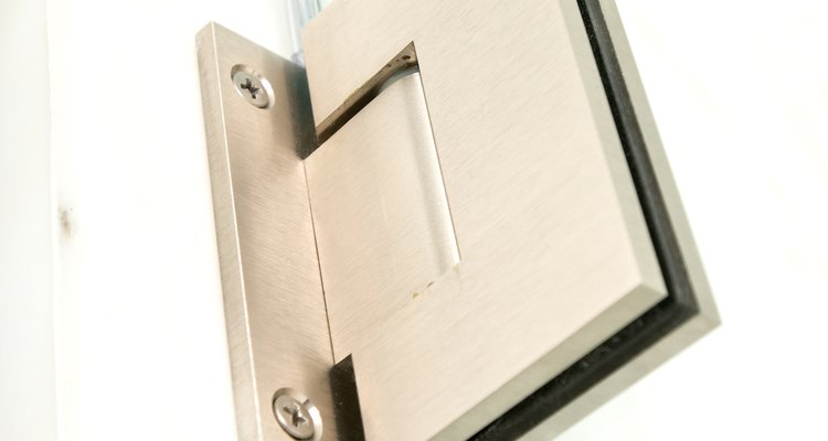 Frameless pivot shower doors have a few different hinge styles.