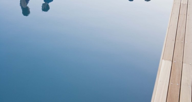 Poolside party and reflection in pool