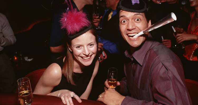 Couple in party hats celebrating