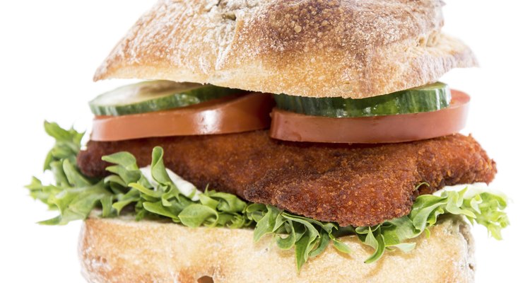 Chicken Schnitzel on a roll (against white)