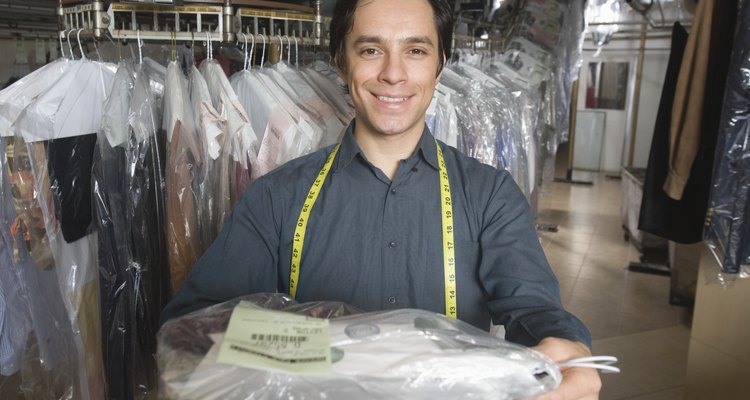 Man working in the laundrette