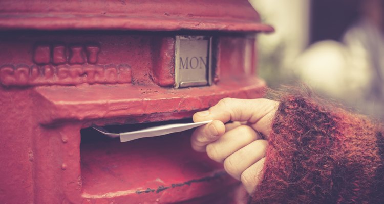 Woman posting letter