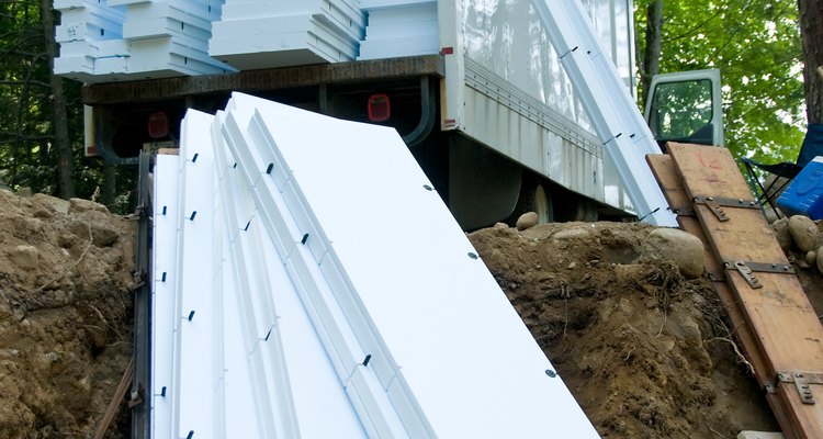 Foam insulation is commonly installed under the siding.