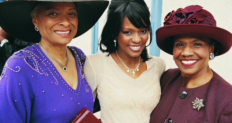 Portrait of Three Smiling Women Standing Outside a Church