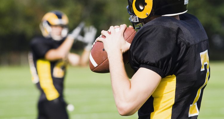 Football players playing in a field