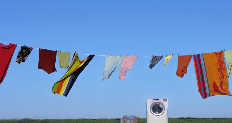 Slide the washing machine off and into its new position