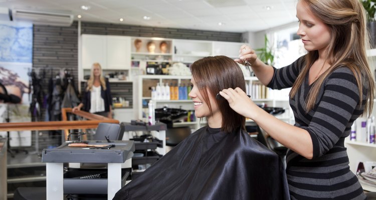 Hairdresser Cutting Client's Hair