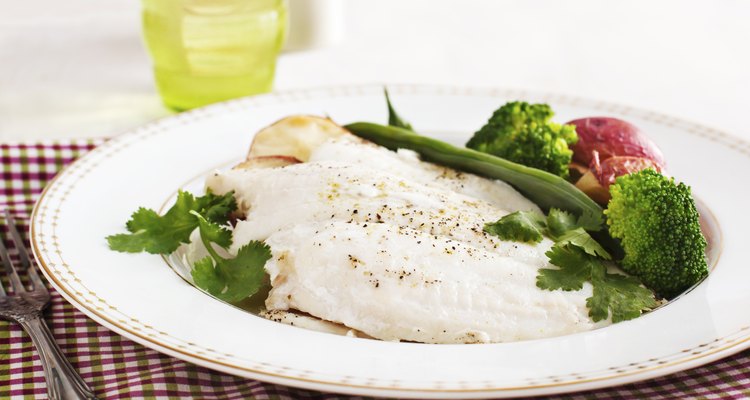 Baked fish fillet served with broccoli, green bean and potato
