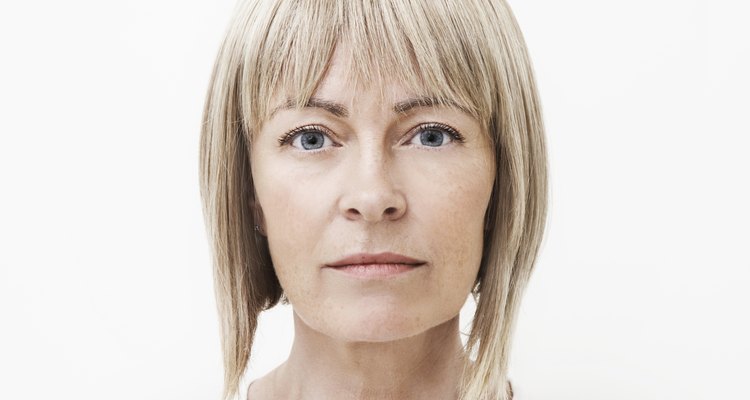 Lowlights can add subtle depth to grey hair.