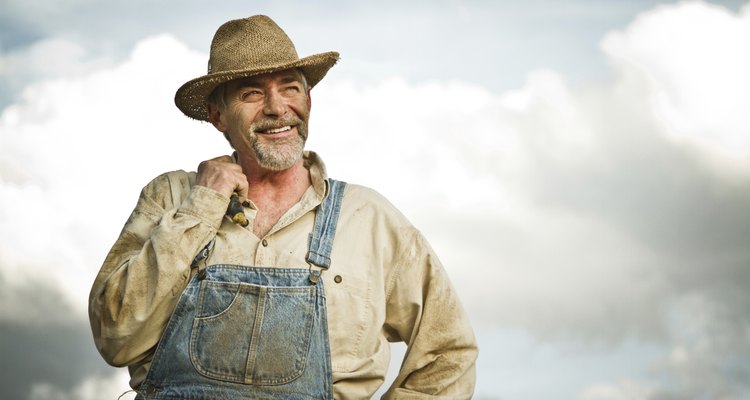 1930s farmer smiling at the Sun